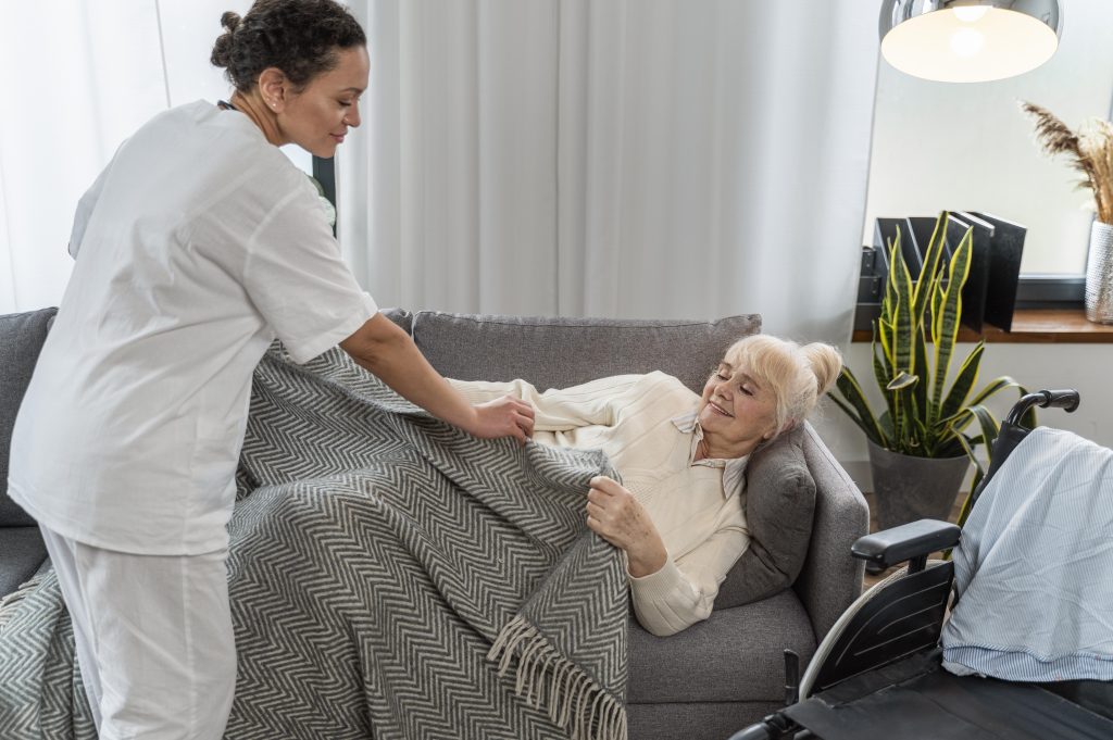 doctor taking care senior woman home scaled